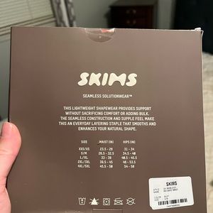 New in box Skims Sculpting mid waist brief S/M buff color